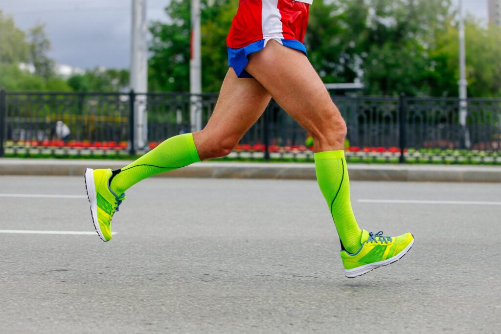 close up legs runner athlete running marathon in c 2026 01 07 23 52 47 utc