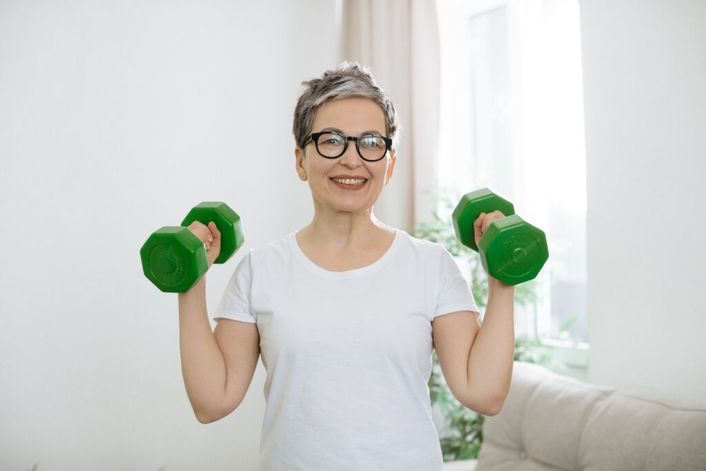 mature woman doing home workout for self care 2026 04 01 16 59 55 utc 1